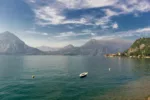 A beautiful terrace of a property in Italy overlooking a lake, illustrating the topic of refinancing property in Italy.