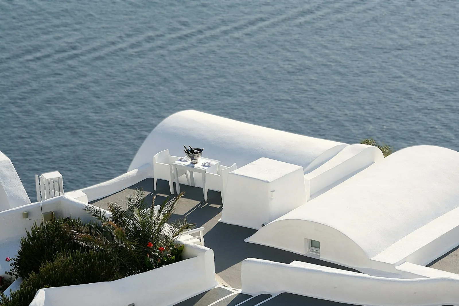 House keys overlooking the sea in Greece, symbolizing a property purchase with a mortgage.