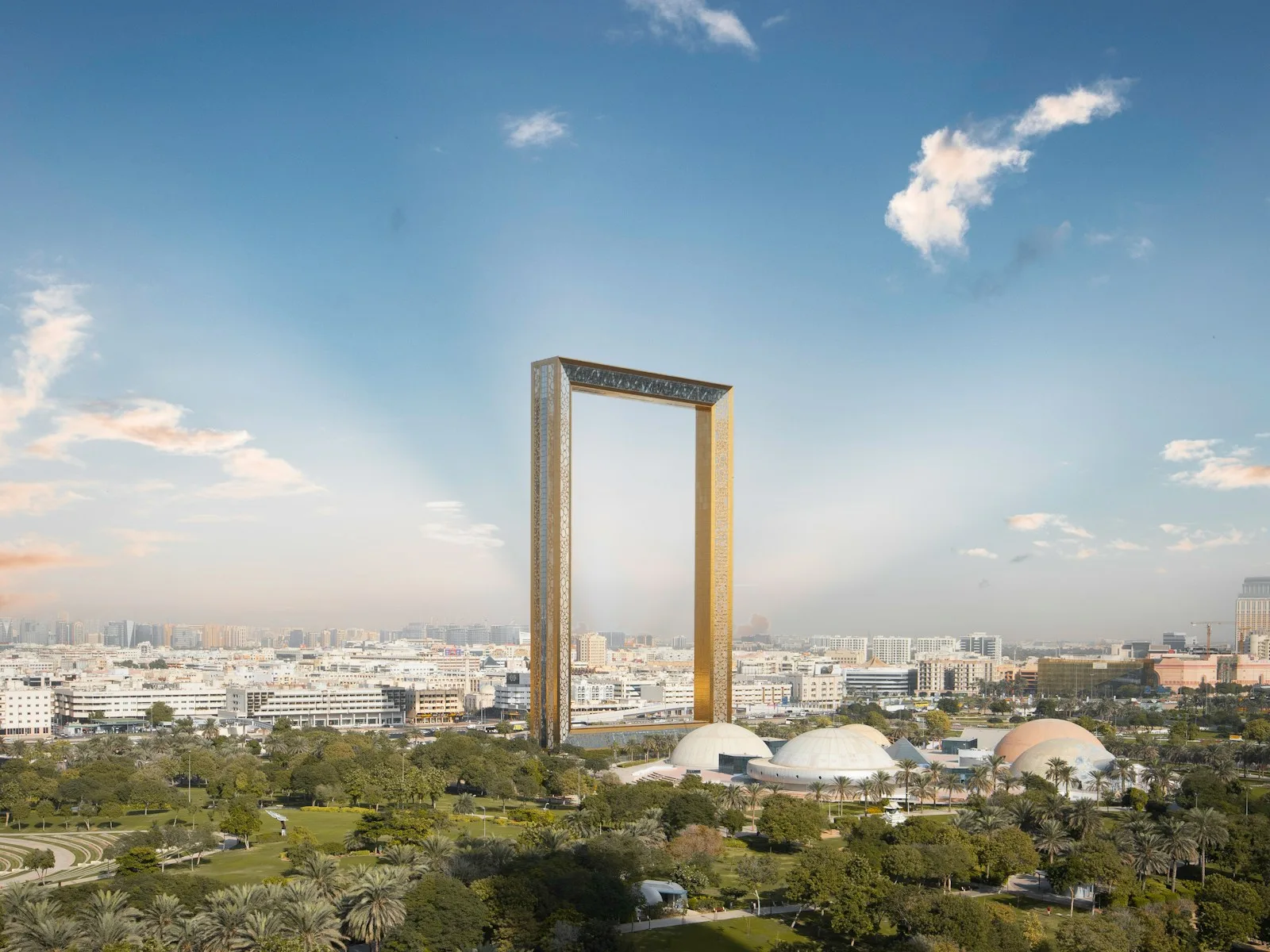 An investor reviewing documents for a UAE residency visa with a modern Dubai building in the background.