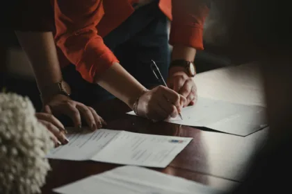 Signing a preliminary contract (compromesso) for a property purchase in Italy in 2025.