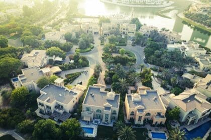 Modern luxury villas with swimming pools on Palm Jumeirah, Dubai, a symbol of the premium Dubai's property market.