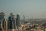 A panoramic view of the modern Dubai skyline, showing the evolution of the Dubai property market over the years.
