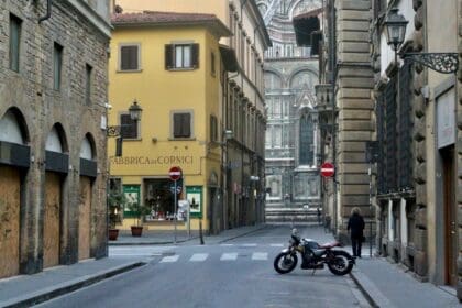 A picturesque street in Florence, Tuscany, with classic Italian architecture, representative of Italy's property market 2025.