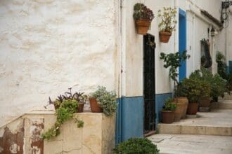 Historic hilltop village in Italy or Spain offering both 1-euro home schemes and affordable real estate investment opportunities.